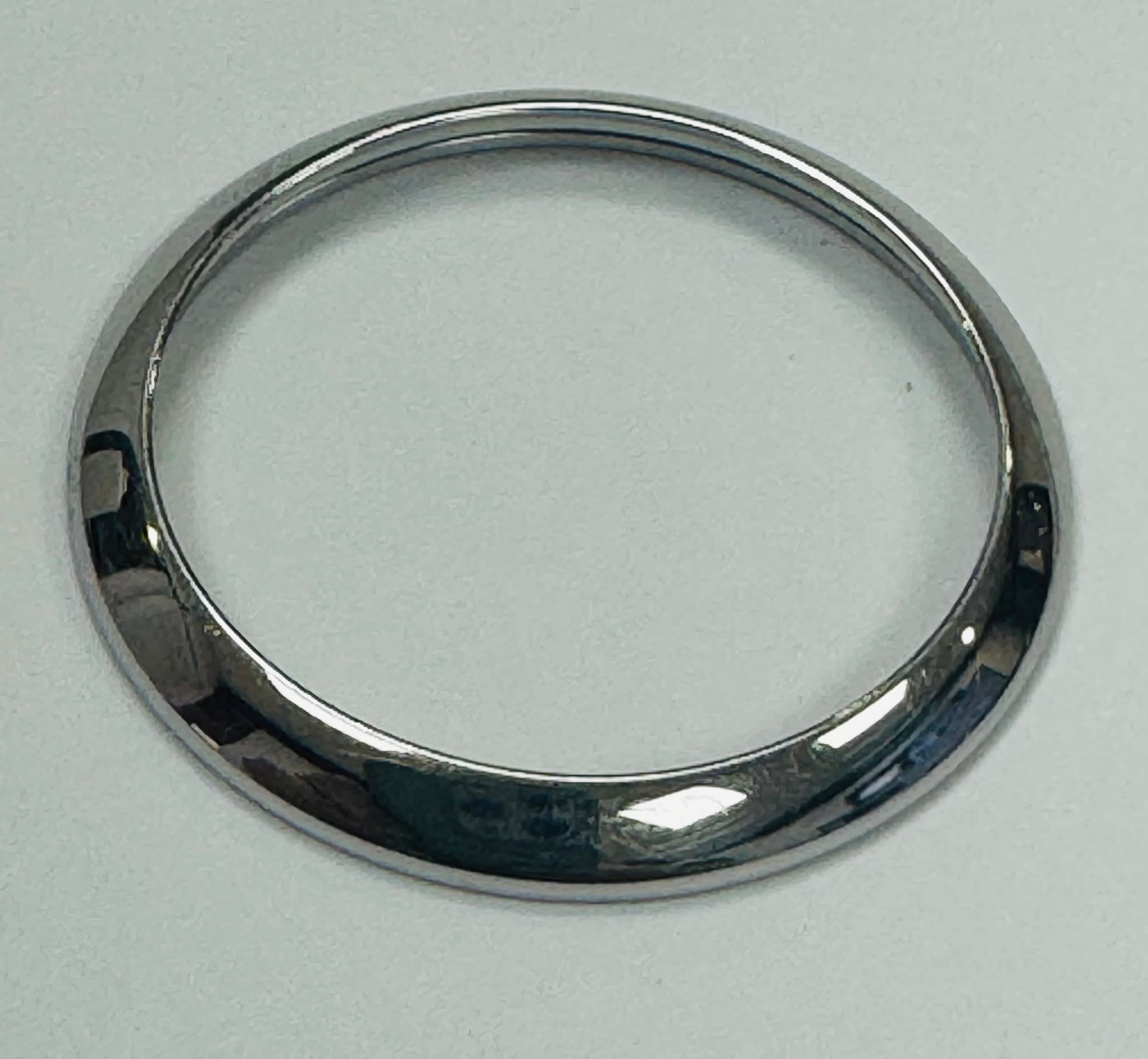 Factory Rolex smooth stainless steel domed bezel for 31 mm Oyster perpetual