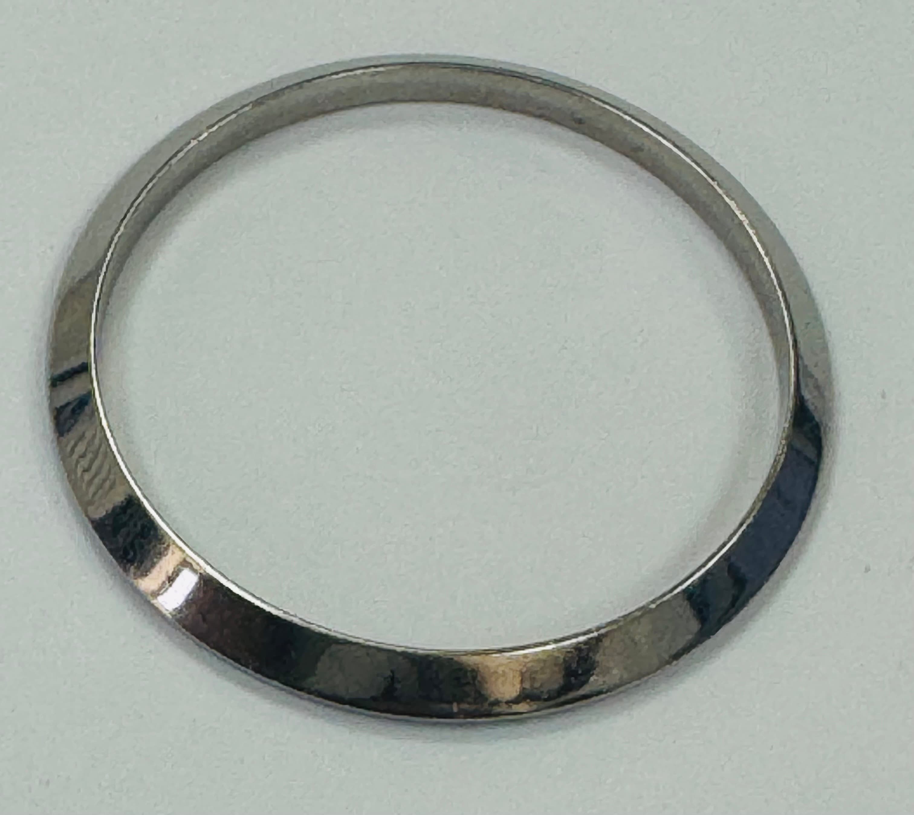 Factory Rolex stainless steel smooth (not domed) bezel for 31 mm not dome.